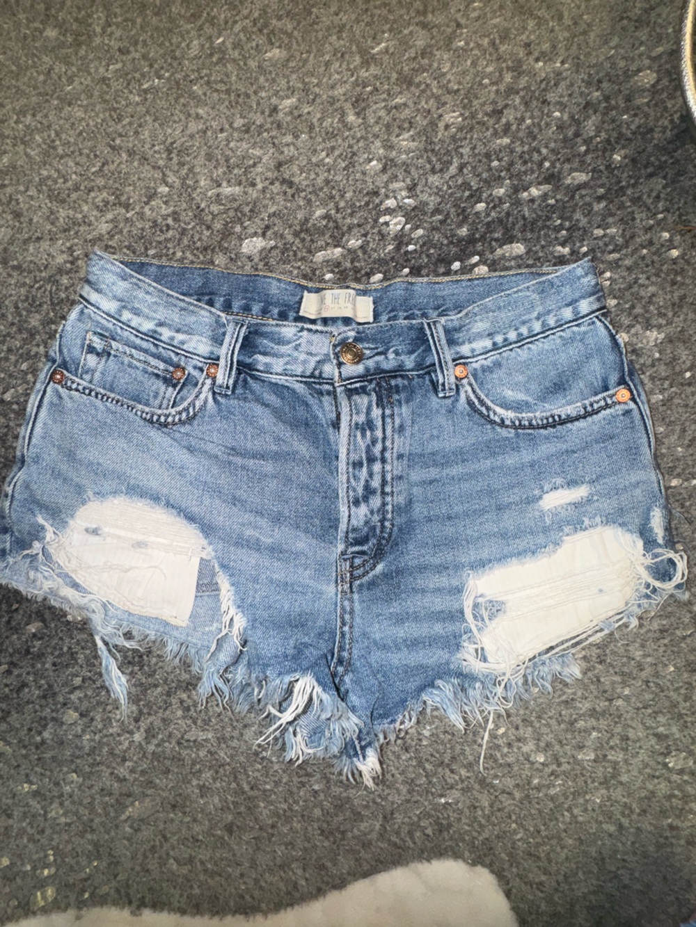 We The Free light blue denim jeans with gold stitching